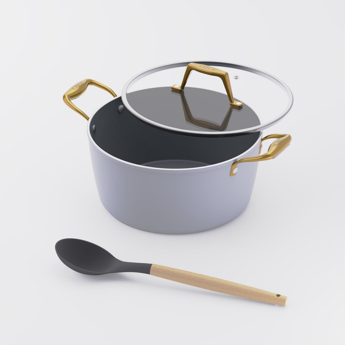 Asai Ceramic Dutch Oven in Clay Grey with gold handles and silicone spoon