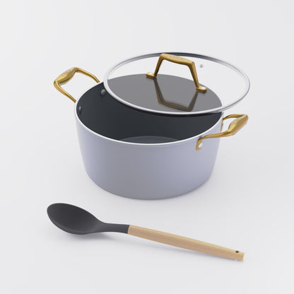 Asai Ceramic Dutch Oven in Clay Grey with gold handles and silicone spoon